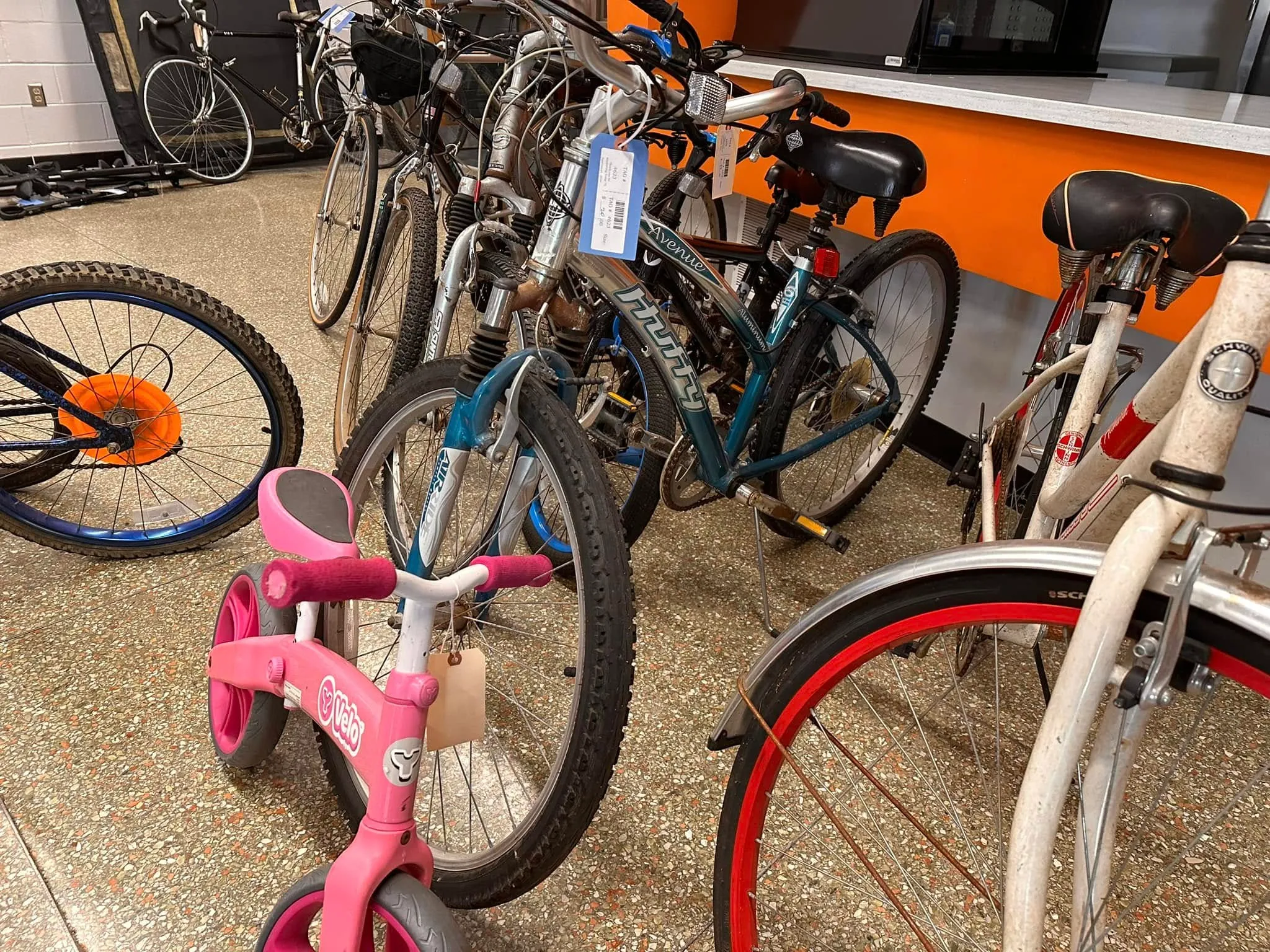 Bikes for sale, from a small pink kids’ bike to adult road and mountain bikes